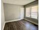 This bedroom features a new window and luxury vinyl flooring at 4814 E New York St, Indianapolis, IN 46201