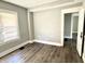 This is an image of the bedroom with a doorway in the corner at 4814 E New York St, Indianapolis, IN 46201