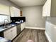 Kitchen features new cabinets, stainless steel appliances, and modern countertops at 4814 E New York St, Indianapolis, IN 46201