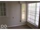 Cozy bedroom with natural light from the multiple windows at 4830 Wentworth Blvd, Indianapolis, IN 46201