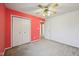 Bedroom with neutral carpet, closet, and a splash of color on one wall at 513 Sun Catcher Dr, Avon, IN 46123