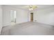 Spacious main bedroom with carpet, ceiling fan and an ensuite bathroom at 513 Sun Catcher Dr, Avon, IN 46123