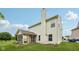 Back exterior view of the home featuring a chimney and a screened in porch at 513 Sun Catcher Dr, Avon, IN 46123