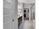 Elegant bathroom featuring double vanity, dark cabinets, and a glass shower at 5273 Nettleton Way, Avon, IN 46123