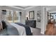 Serene bedroom showcasing natural light and modern decor at 5273 Nettleton Way, Avon, IN 46123