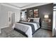 Cozy bedroom with tray ceiling, carpet, and designer touches at 5273 Nettleton Way, Avon, IN 46123
