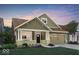 Charming single-Gathering home featuring a covered front porch and attached two car garage at 5273 Nettleton Way, Avon, IN 46123