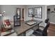 Stylish office design with decor, a desk and a chair, with view to a closet at 5273 Nettleton Way, Avon, IN 46123