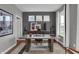 Home office featuring a modern desk, neutral walls, and natural light from three windows at 5273 Nettleton Way, Avon, IN 46123