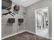 Well-organized walk-in closet with shelves and doorway view of ensuite bathroom at 5273 Nettleton Way, Avon, IN 46123