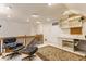 Bonus room featuring a lofted ceiling, office area, and comfortable chair at 5326 White Marsh Ln, Indianapolis, IN 46226