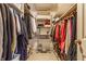 Well-organized walk-in closet with clothing racks, shelves, and storage, maximizing space and convenience at 5326 White Marsh Ln, Indianapolis, IN 46226