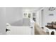 Upstairs hallway featuring neutral decor and ample space, leading to various rooms at 5420 Orwell Ct, Indianapolis, IN 46239