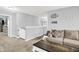 Upstairs living room featuring plush seating and neutral decor, creating a welcoming atmosphere at 5420 Orwell Ct, Indianapolis, IN 46239