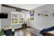 Bright playroom with a large window, desk, and plenty of space for activities at 5420 Orwell Ct, Indianapolis, IN 46239