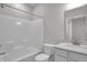 Bathroom featuring a white vanity, toilet, and tub-shower combination at 633 Bridgeman Rd, Avon, IN 46123