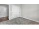 Bedroom featuring neutral carpet, gray walls, white trim and doors, and natural light at 633 Bridgeman Rd, Avon, IN 46123
