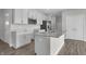 Kitchen featuring a center island with pendant lighting, stainless steel appliances, and ample storage at 633 Bridgeman Rd, Avon, IN 46123