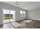 Dining Room showing sliding glass doors leading to the patio and large windows at 633 Bridgeman Rd, Avon, IN 46123