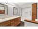 Bathroom featuring a double vanity and tub/shower combo at 6580 N Us Highway 31, Whiteland, IN 46184