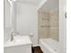 Cozy bathroom with tiled shower, modern fixtures, and vanity with sink at 6580 N Us Highway 31, Whiteland, IN 46184
