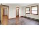 Bedroom with dark floors and natural light at 6580 N Us Highway 31, Whiteland, IN 46184
