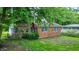 Charming brick home with mature trees, offering a serene setting and classic appeal at 6580 N Us Highway 31, Whiteland, IN 46184