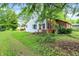 Well-maintained home featuring a brick and siding exterior, set on a green lawn at 6580 N Us Highway 31, Whiteland, IN 46184