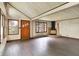 Bright living area with wood floors, fireplace, and natural light from large windows at 6580 N Us Highway 31, Whiteland, IN 46184