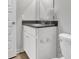 Modern bathroom features a white vanity with dark countertop and stylish chrome fixtures at 6675 Halsey St, Zionsville, IN 46077