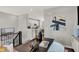 Bright dining area features modern decor and convenient access to the kitchen in this stylishly appointed home at 6706 Halsey St, Zionsville, IN 46077