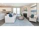 Open living room with view of kitchen and dining area at 7595 Bluegill Dr, Noblesville, IN 46062