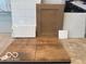 Sample of kitchen materials, including the backsplash, countertop, cabinet color and floor tile at 7595 Bluegill Dr, Noblesville, IN 46062
