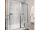 This walk-in shower has marble-style tiles and a built-in bench at 7595 Bluegill Dr, Noblesville, IN 46062