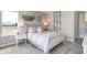 Bedroom with a white metal bed frame, carpet flooring, and modern wall decor at 7664 Allesley Dr, Avon, IN 46123