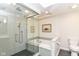 Contemporary bathroom with a glass-enclosed shower, a tub, and tiled floors at 7775 N Meridian St, Indianapolis, IN 46260