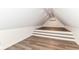 Finished attic space featuring hardwood floors, recessed lighting and air conditioning unit at 7775 N Meridian St, Indianapolis, IN 46260