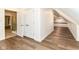 Attic bedroom space with hardwood floors, recessed lighting, and ensuite bathroom at 7775 N Meridian St, Indianapolis, IN 46260