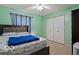 Bed is made with stylish patterned sheets in a comfortable bedroom at 813 Boulder Rd, Indianapolis, IN 46217