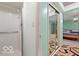 View of the bedroom showing the closet and shower area at 813 Boulder Rd, Indianapolis, IN 46217