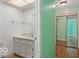 Hallway view showing a bathroom and closet on the right side at 813 Boulder Rd, Indianapolis, IN 46217