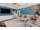 Stylish living room with a beamed ceiling, hardwood floors, and neutral decor for a comfortable atmosphere at 813 Boulder Rd, Indianapolis, IN 46217