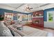 Spacious living room with brick fireplace and large sectional sofa at 813 Boulder Rd, Indianapolis, IN 46217