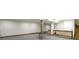 Spacious basement featuring gray concrete flooring and a stone bar at 823 W 200 N, Greenfield, IN 46140