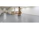 Open basement featuring concrete floors, exposed support beam, and wet bar at 823 W 200 N, Greenfield, IN 46140