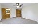 Large bedroom featuring a view into the bathroom, neutral walls and gray carpet at 823 W 200 N, Greenfield, IN 46140
