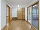 Bright bonus room with wood flooring and sliding doors to the outdoors at 823 W 200 N, Greenfield, IN 46140