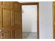 Bedroom closet with an opened door and plenty of storage at 823 W 200 N, Greenfield, IN 46140