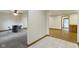 A view of the dining room and open floorplan with fresh paint, and new floors at 823 W 200 N, Greenfield, IN 46140