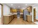 Modern kitchen featuring stainless steel appliances and oak cabinets at 823 W 200 N, Greenfield, IN 46140